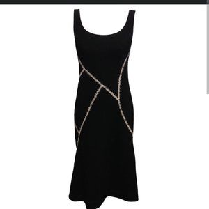Alexander McQueen black dress with white cross stitching